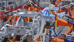 Frames of cars are are in a production line